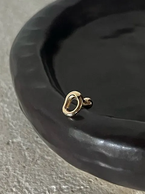 14k oval line piercing