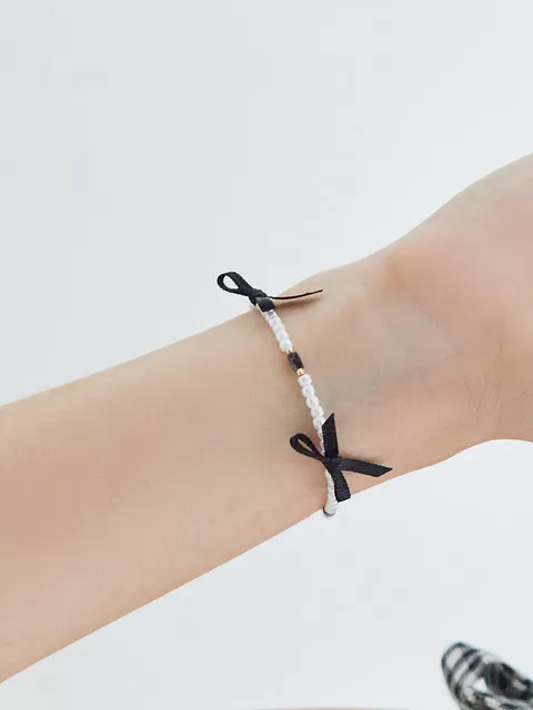 triple black ribbon pearl-bracelet